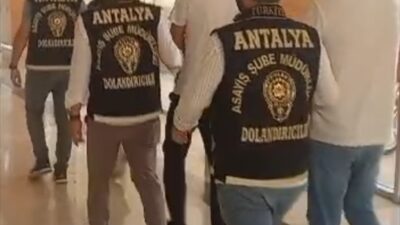 Antalya'da telefonda kendilerini polis olarak tanıtarak dolandırıcılık yaptıkları iddiasıyla gözaltına