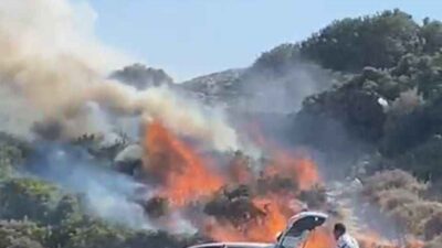 Urla'nın Demircili Koyu'nda 4 gencin yaktığı mangal rüzgarla devrilince bir