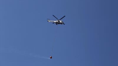 MUĞLA (AA) – Turgutlar Mahallesi yakınlarındaki ormanlık alandan dumanların y&uuml;kseldiğini